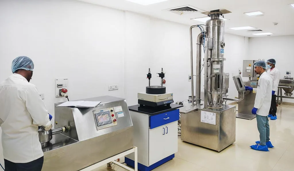 Wide view of the Stabicon granulation and processing suite with high-shear mixer and fluid bed processor